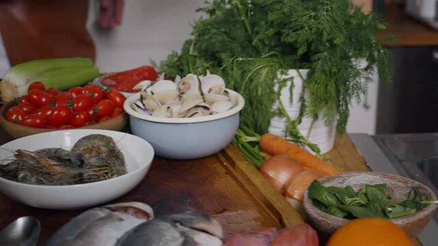 Cleaning Shells For Cooking. Various seafoods on chef kitchen. Tasty seafood food. Food preparation footage. Slow motion food video.