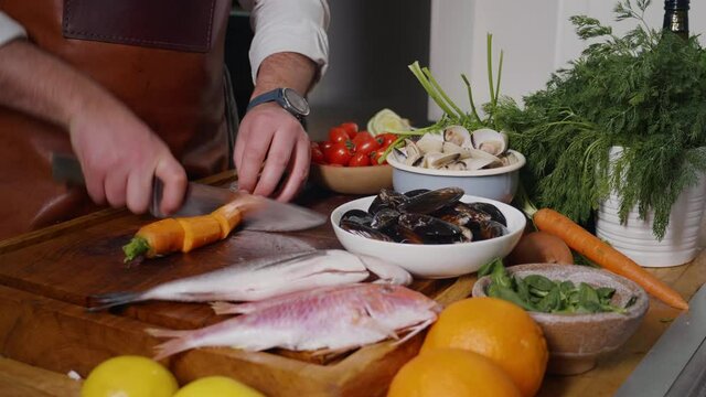 Process of mediterranean dish preparation. Fresh Mollusks Fish Shell Shrimp. Cooking Seafood. Slow Motion Footage.