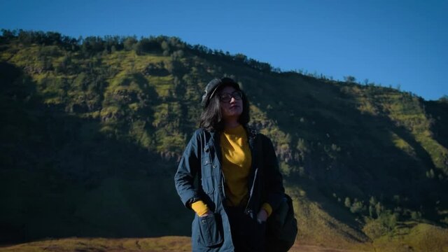 Asian woman in the mountains