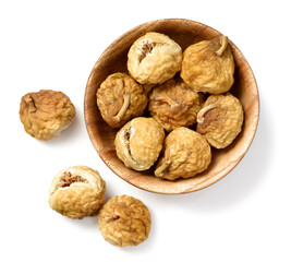 close up of dried fig fruits in the wooden bowl, isolated on the white background, top view