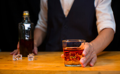 Bartender Serve Whiskey, on wood bar, 