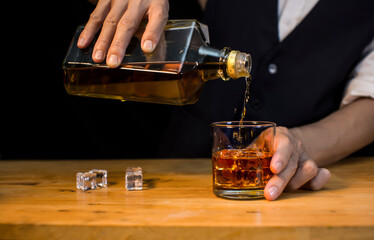 Bartender Serve Whiskey, on wood bar, 