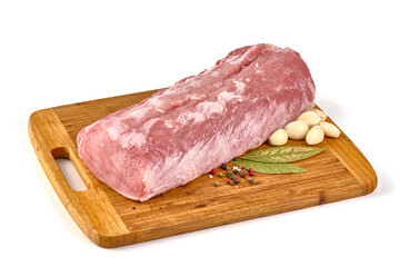 Raw pork loin with condiments, isolated on white background.