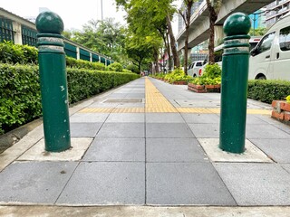 A symbolic pedestrian walkway to help those who can't see but can't continually build to perfection.