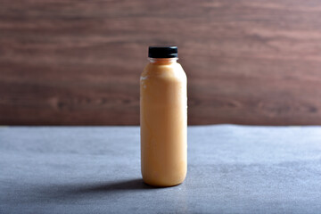 bottle of yellow mango yogurt
