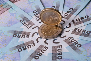 Several bills in denominations of 20 euro and 1 euro coin