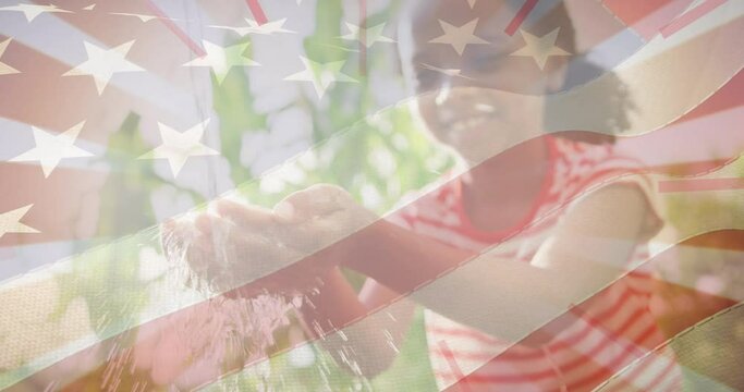 Animation of flag of united states of america over african american girl washing hands