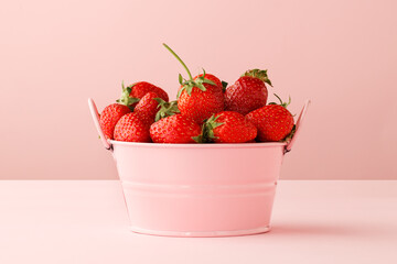 Strawberry - delicious fruit in bowl, food background, minimal concept