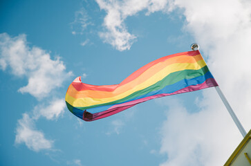 Waving rainbow pride flag in Helsinki