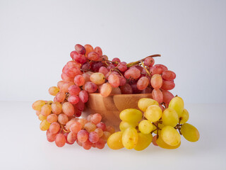 red seedless grapes isolated on white background