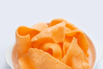 Prawn crackers on white background. Shrimp crispy rice snack