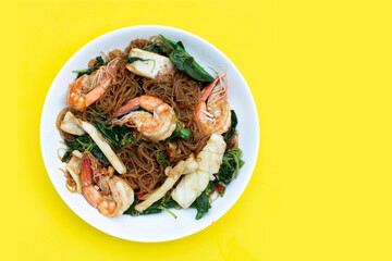Spicy stir fried vermicelli with holy basil leaves and sea food