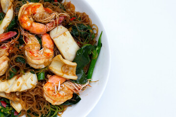 Spicy stir fried vermicelli with holy basil leaves and sea food