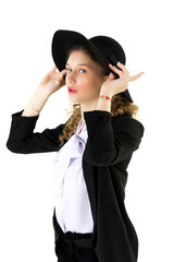 Beautiful woman in classic elegant outfit and hat