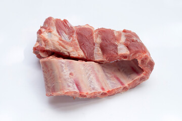 Raw pork ribs on white background.