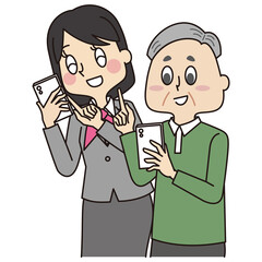 スマホの操作を習うシニア男性と教える制服姿の携帯ショップ店員の男性
