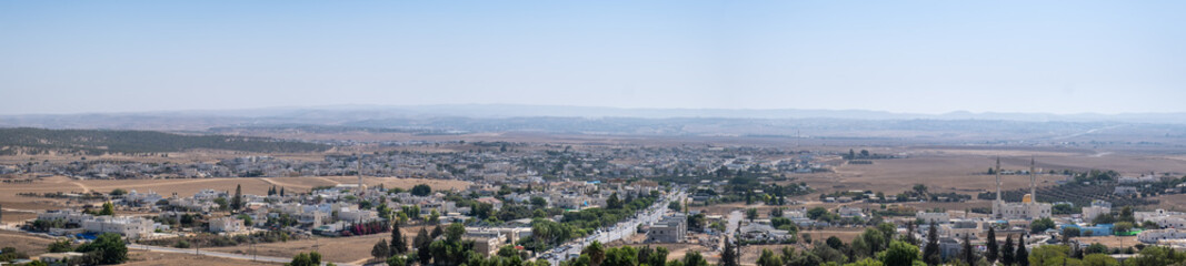 Fototapeta na wymiar Large aerial view on Lakiya or Laqye - a Bedouin town in the Southern District of Israel