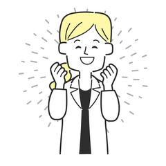 ガッツポーズをして喜んでいる医師