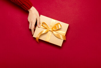 Christmas gift box decorated with a bow