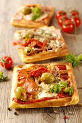 pizza waffle with cheese and ham