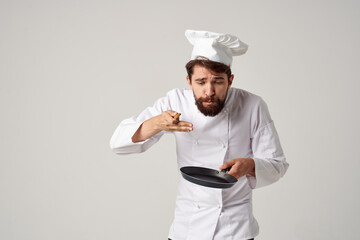 cook with kitchen utensils restaurant kitchen work