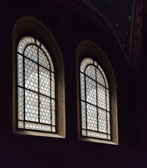 two ancient windows with leaded glass