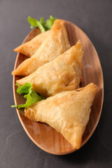 fried samosa and lettuce
