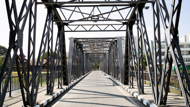 A robustic iron frame of an old brige in the City of Chiangmai, Thailand.