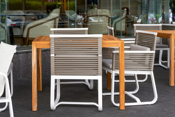 Outdoor cafe tables and chairs in a shopping mall