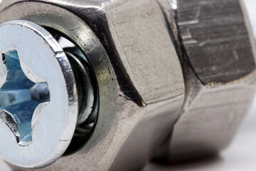 close-up nuts and bolts isolated on white background