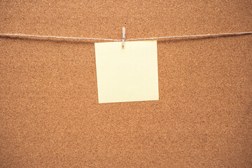 Note paper swith push pins on cork board. Empty paper pages for notes copy space for text. Cork...