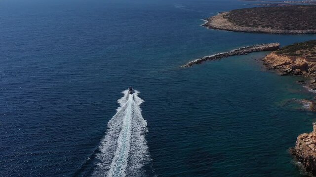 Inflatable Boat In Paros Island Of Greece. View from above with drone