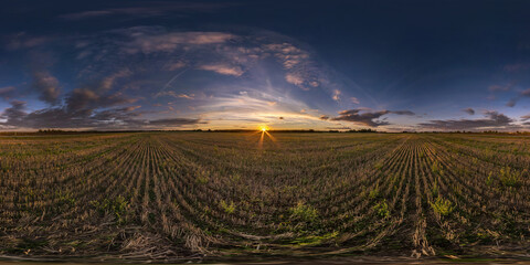 evening hdri panorama 360 view among farming fields with sunset clouds in equirectangular spherical projection, ready for VR AR virtual reality content
