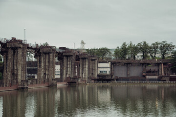 Naklejka premium Old lock near the hydroelectric power plant