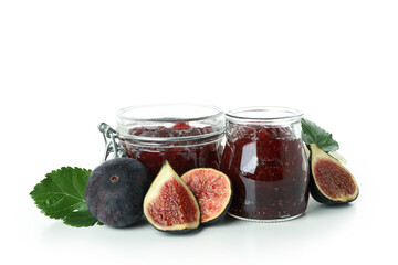 Jars with fig jam and ingredients isolated on white background