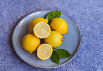 Fresh Yellow Lemons in a Dish .Top View.
