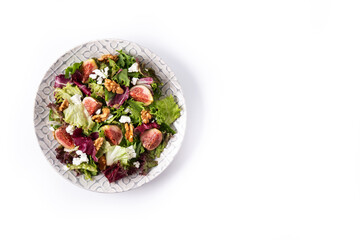 Figs salad with cheese and walnuts isolated on white background. Top view.Copy space