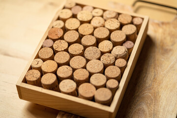 Bunch of wine corks on wooden table