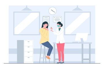 A woman getting vaccinated by nurses