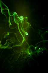 Green smoke motion on black background.
