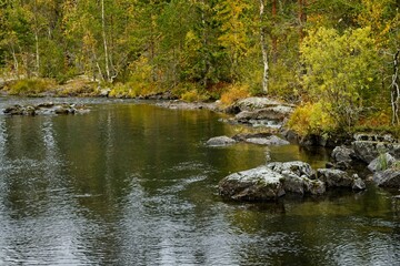 Fototapeta na wymiar Forsaleden autumn landscape in northern Sweden