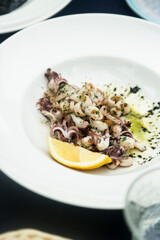 Roasted seafood with lemon and green sauce