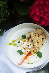 Traditional labne cheese with chickpea and pita bread
