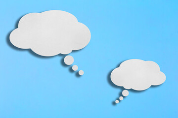 paper speech bubble on blue background