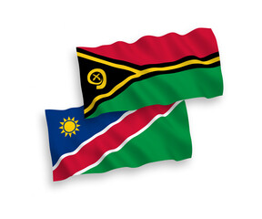 National vector fabric wave flags of Republic of Vanuatu and Republic of Namibia isolated on white background. 1 to 2 proportion.