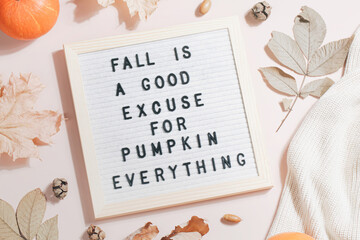 felt letter board and text fall is good excuse for pumpkin everything and leaves, pumpkins, sweater on beige background