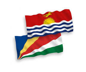 National vector fabric wave flags of Republic of Kiribati and Seychelles isolated on white background. 1 to 2 proportion.