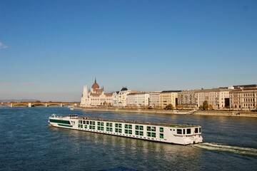 hungarian parliament building from Danubio river cruise boat - obrazy, fototapety, plakaty