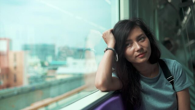 Beautiful girl travelling in a train of underground