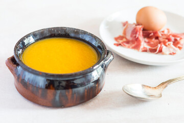 Cream of pumpkin with ham and egg